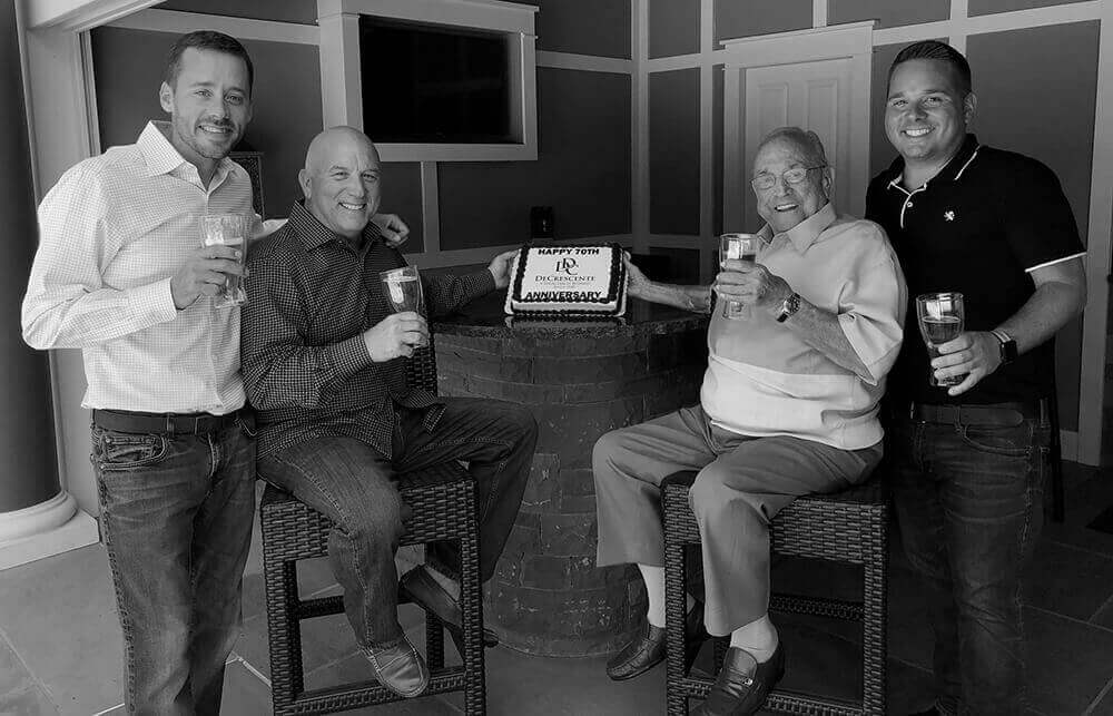 Carmine III, CJ, Carmine Sr, and Matt with beer and a cake